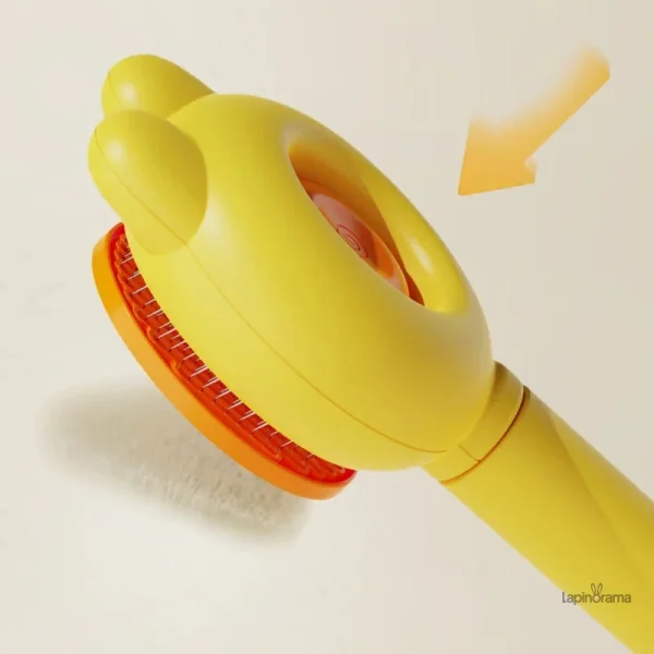 Brosse ergonomique pour le toilettage des lapins